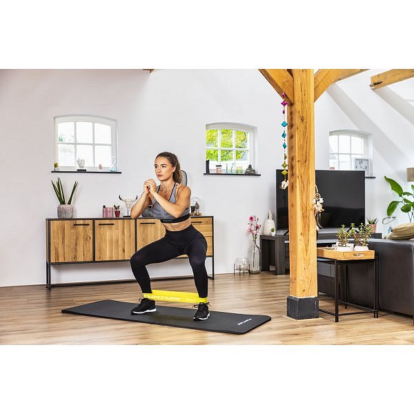 Odporová guma textilní TUNTURI Resistance Band - lehká žlutá